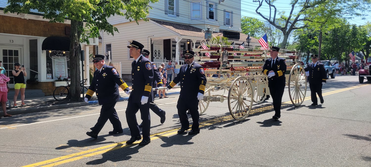 The Bellport Fire Department marches during the Bellport Village Memorial Day Parade.